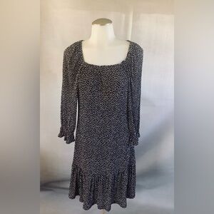 Size 8 medium black, and white puffy long sleeve flowing ruffled skirt